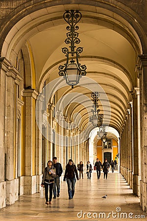 Arcades. Gallery surrounding Palace Square or Commerce Square. Lisbon. Portugal Editorial Stock Photo