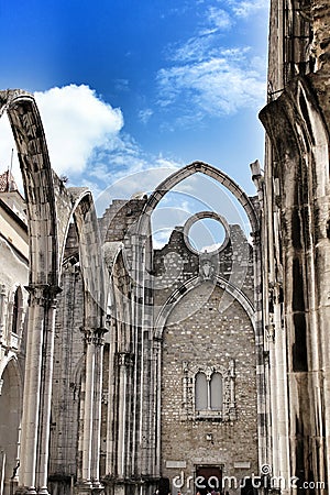Arcades, pillars and facade of Do Carmo convent in Lisbon Editorial Stock Photo