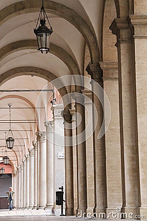 Arcades under the buildings, porticoes along the building, typical Bologna architecture Editorial Stock Photo