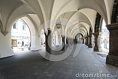 Arcades under the townhall of Luebeck, Germany, historic architecture at the market place in the old town in the city center, copy Editorial Stock Photo