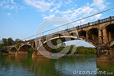 Arch bridge in chese counryside Stock Photo