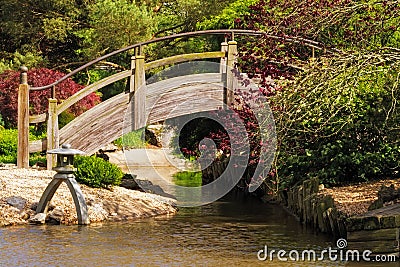 Arch Bridge in a Japanese Style Garden Stock Photo