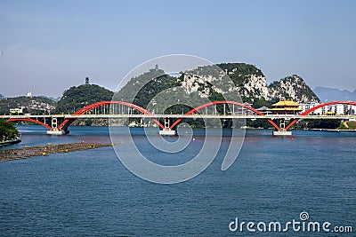 Arch bridge on river with natural landscape,Liuzhou,China Stock Photo