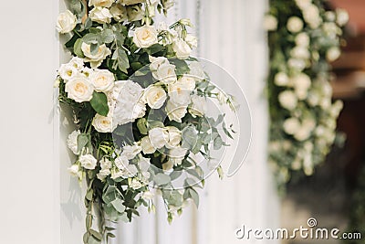 Arch decorated with flowers at the wedding caremony Stock Photo