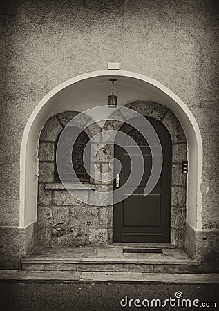 Arch door and wall in sepia Stock Photo