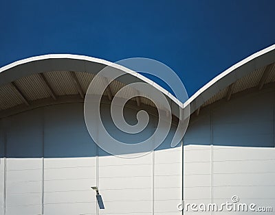 Arch formed roof of modern building used for Aircraft Exhibitions Stock Photo