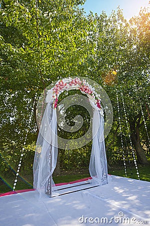 Arch for the wedding ceremony. Floristic composition Stock Photo