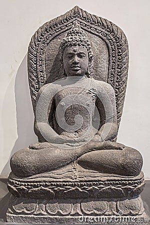 Archaeological sandstone statue of Gautam Buddha in meditation Stock Photo