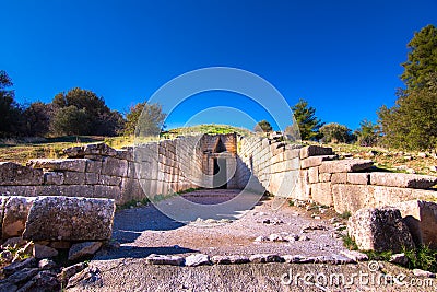 The archaeological site of Mycenae near the village of Mykines, with ancient tombs, giant walls and the famous lions gate. Stock Photo