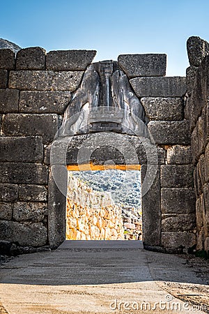 The archaeological site of Mycenae near the village of Mykines, with ancient tombs, giant walls and the famous lions gate. Stock Photo