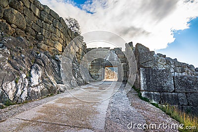 The archaeological site of Mycenae near the village of Mykines, with ancient tombs, giant walls and the famous lions gate. Stock Photo