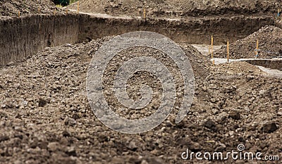 Archaeological work, archaeologists dug a hole in field to search for historical artifacts and finds Stock Photo