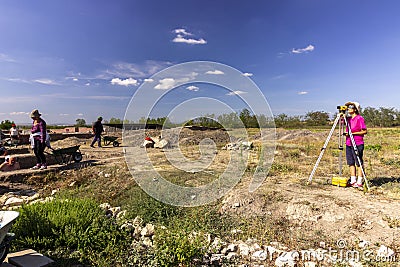 Archaeologist excavating near an old fortress Editorial Stock Photo