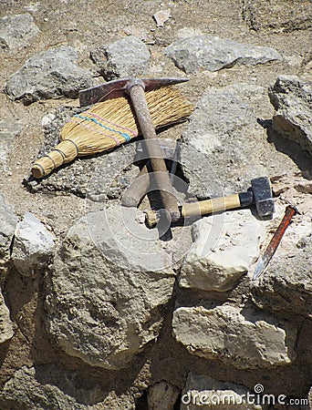 Archaeologist tools on excavation site Stock Photo