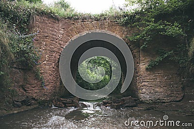 arched bridge across the river. ancient arch. bridge across the river Stock Photo