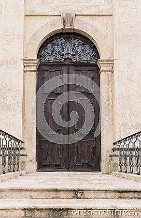 Arched entrance of a medieval palace. Stock Photo