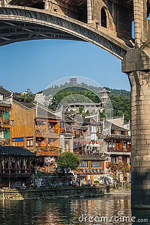 Road bridge over Tuo Jiang river in Feng Huang Editorial Stock Photo