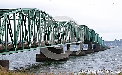 Arched long sectional bridge over Columbia River in Astoria Stock Photo