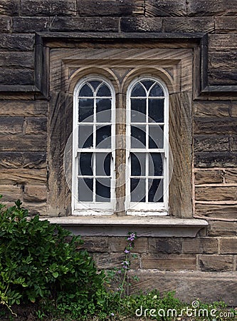 Arched sliding sash windows Stock Photo