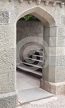 Arched stone doorway and staircase Stock Photo