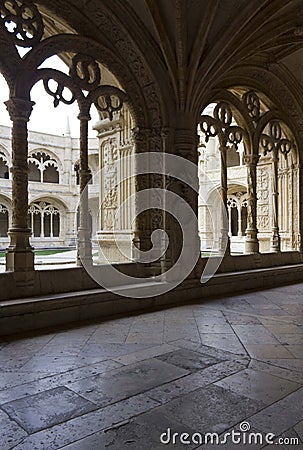 Arched window of the cloister of Jeronimos Monastery Editorial Stock Photo