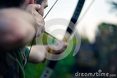 Archer aiming Stock Photo