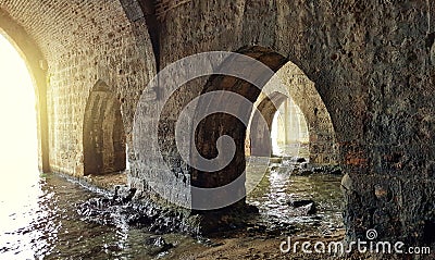 Arches inside ancient shipyard of Alanya. Turkey, Asia Stock Photo