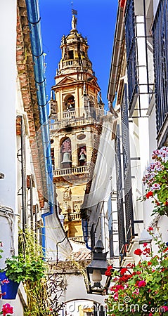 Flower Street Calleja de las Flores Old Torre del Alminar Bell Tower Mezquita Cordoba Andalusia Spain. Stock Photo