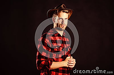 Archetypal image of Americans abroad. Masculinity and brutality concept. Adopt cowboy mannerisms as a fashion pose Stock Photo