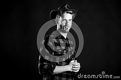 Archetypal image of Americans abroad. Masculinity and brutality concept. Adopt cowboy mannerisms as a fashion pose Stock Photo