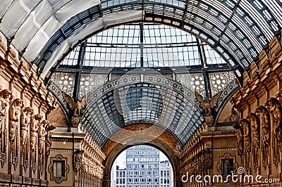 The arching glass and cast iron roof of Galleria Vittorio Emanuele II in Milan, Italy. Stock Photo