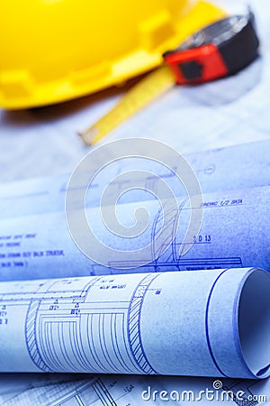 Architect design printout and safety helmet Stock Photo