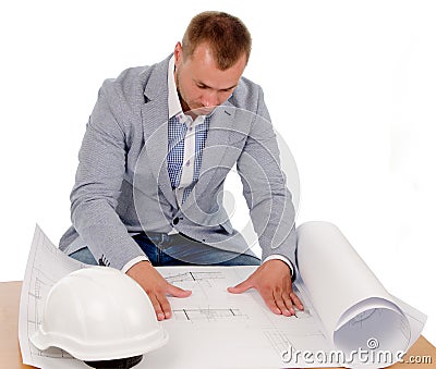 Architect or engineer studying building plans Stock Photo