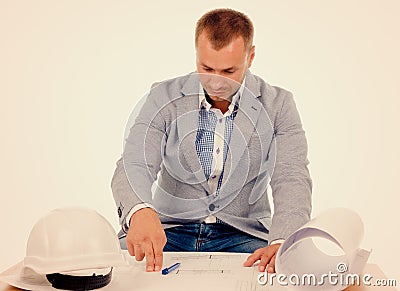 Architect or engineer studying building plans Stock Photo