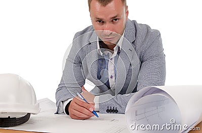 Architect or engineer studying building plans Stock Photo