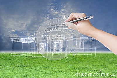Architect hand drawing a house Stock Photo