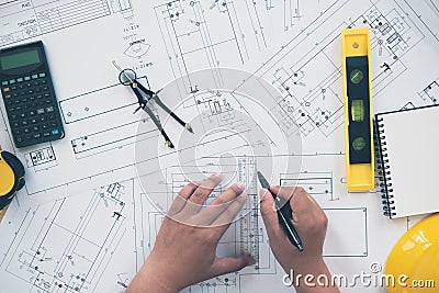 Architect or planner working on drawings for construction Stock Photo