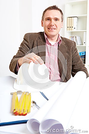 Architect sitting in office Stock Photo