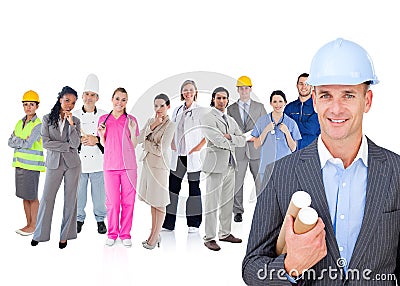 Architect standing in front of different types of workers Stock Photo