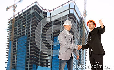 Architect and structural engineer shaking hands Stock Photo