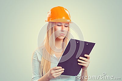 Architect thinking looking at notepad Stock Photo