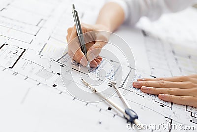 Architect working on blueprint Stock Photo