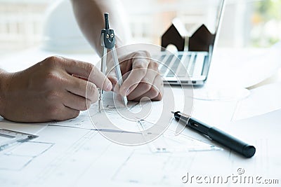 Architect working on real estate project at workplace. Engineer Stock Photo