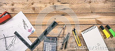 Architect workplace. Project construction blueprints and engineering tools on wooden desk, copy space Stock Photo