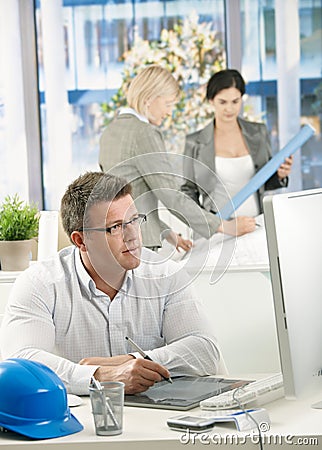 Architects concentrating on work Stock Photo