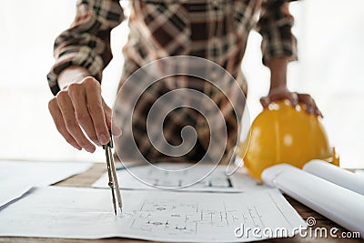 Architects talking at the table Teamwork and Workflow Creation Concepts, Close-up of Person Engineer& x27;s Hand Drawn Stock Photo