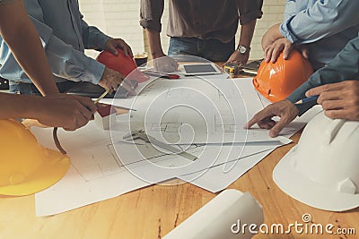 Architects team working with blueprints Stock Photo