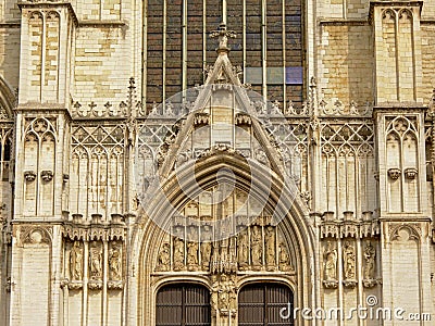 Architectural detail of Brussels Cathedral with arch and statues of saints Stock Photo