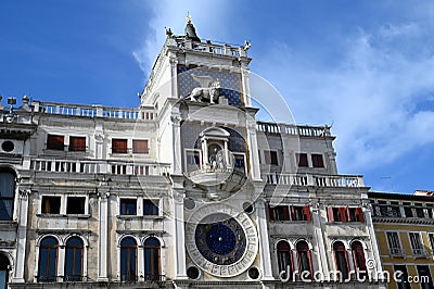 The clock tower of St. Mark's Square in Venice on a sunny day Stock Photo