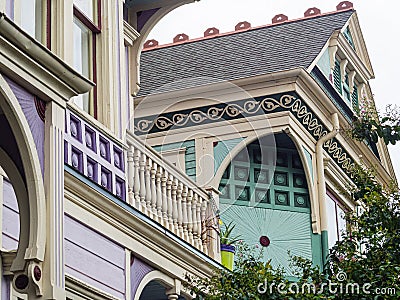 Architectural details and colorful paint job on exterior of Victorian House Editorial Stock Photo